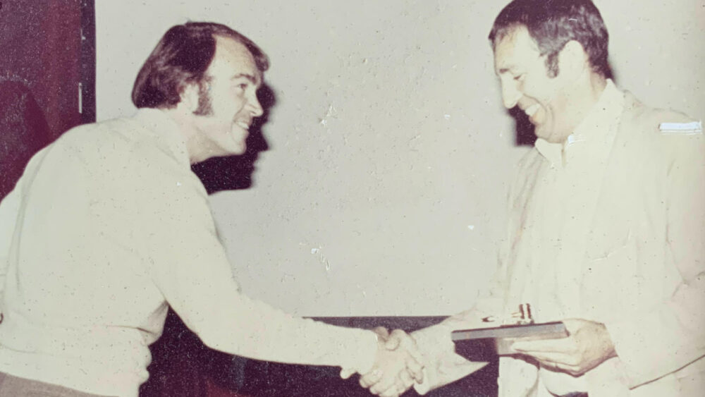 Lou Brown (right) transferring the TASH Board of Directors Chairmanship to Wayne Sailor (left).